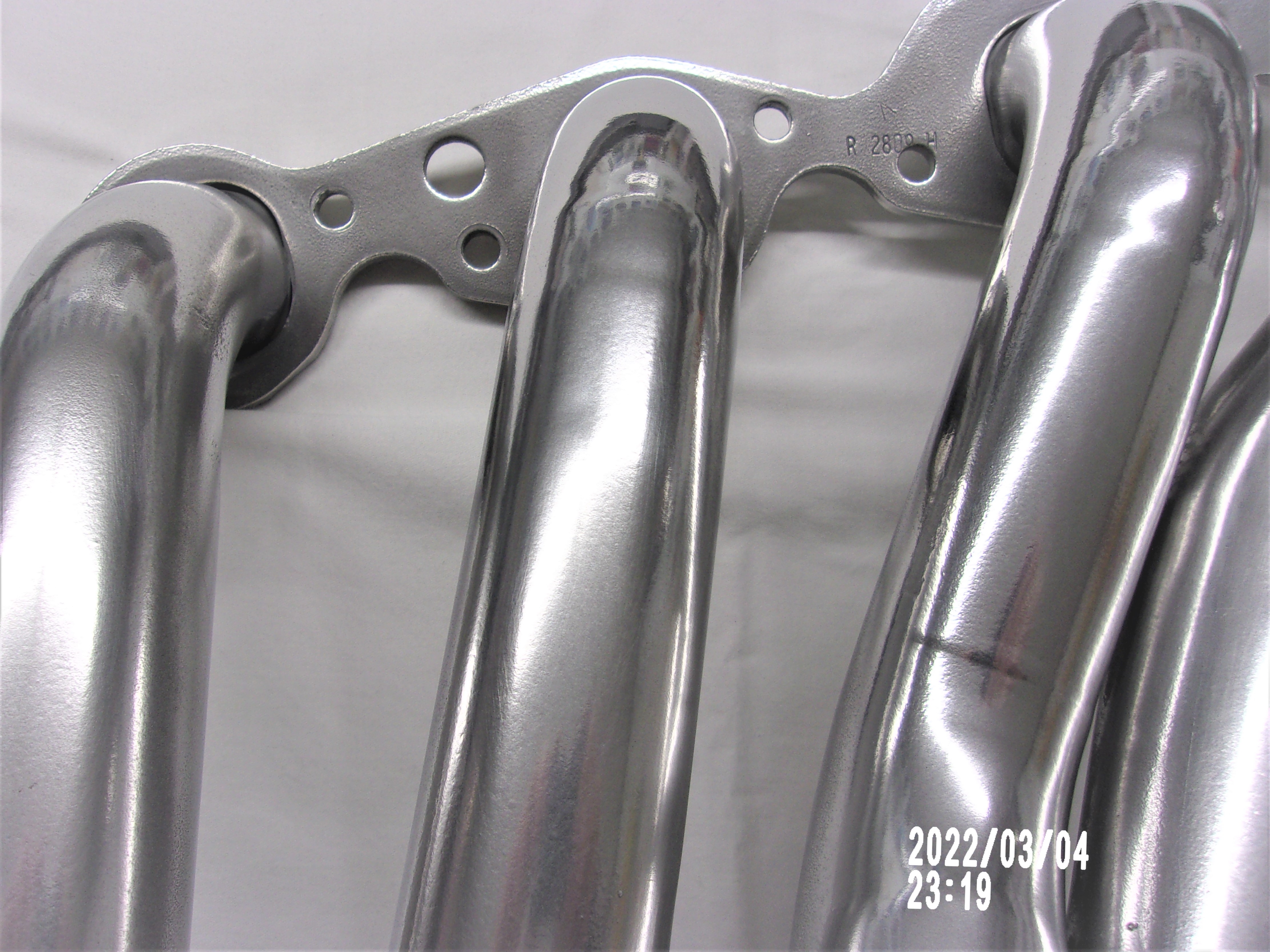 Chrome-like ceramic-coated header tubes (Cermakrome example).